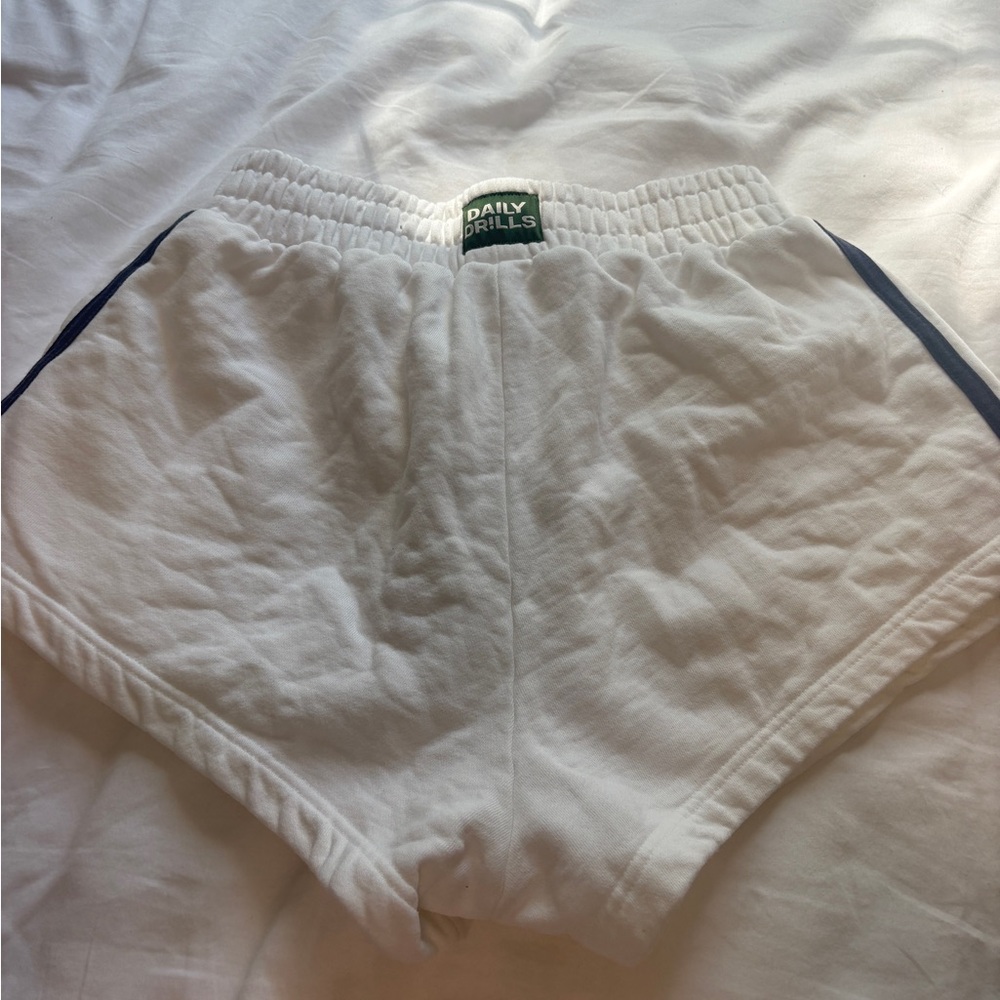 Daily Drills White Shorts with Navy Side Stripe